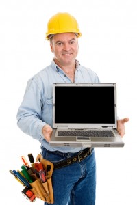 man carrying a laptop